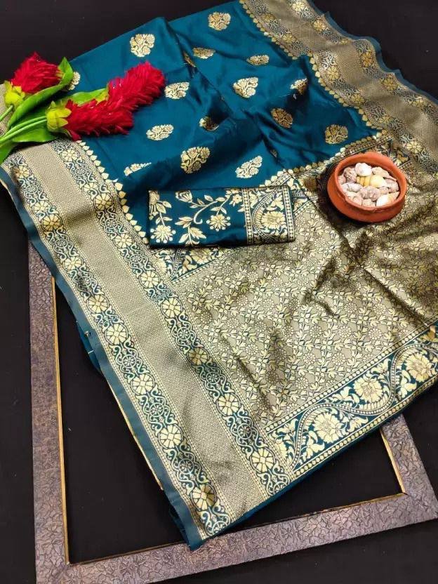 Silk Saree from the LAZUKI store is adorned with beautiful Zari work in form of traditional motifs. This beautiful saree is elegantly decorated with gorgeous Solid Jacquard weave that gives a perfect look to the outfit.