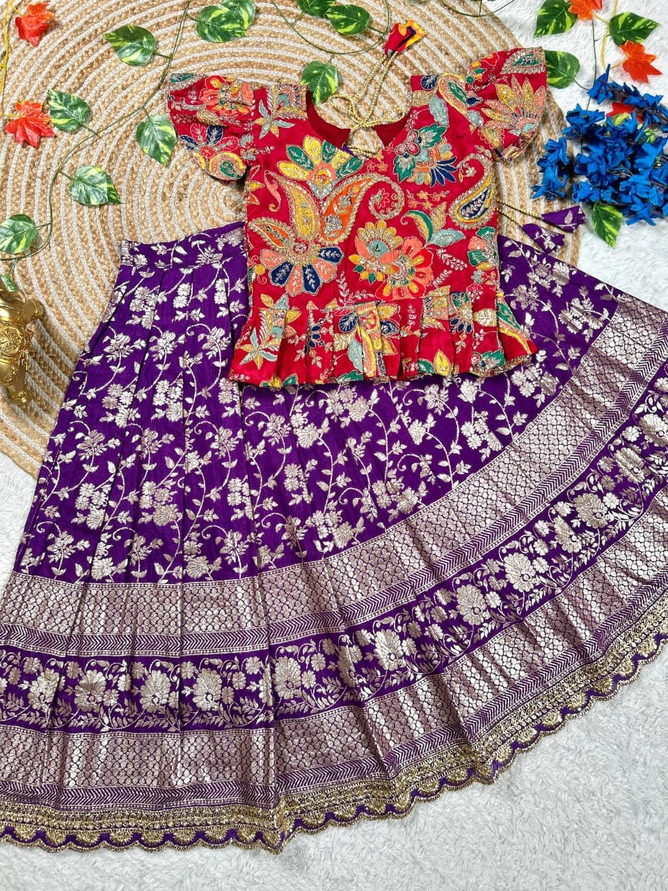 Adorable kids' collection featuring a position print blouse paired with a golden jari work skirt. The outfit combines playful prints with luxurious golden Weaving, perfect for little ones to shine on special occasions. - Image 7