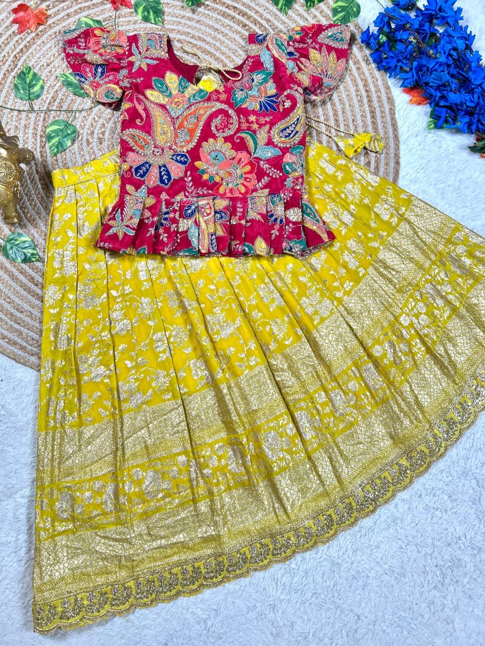 Adorable kids' collection featuring a position print blouse paired with a golden jari work skirt. The outfit combines playful prints with luxurious golden Weaving, perfect for little ones to shine on special occasions. - Image 6