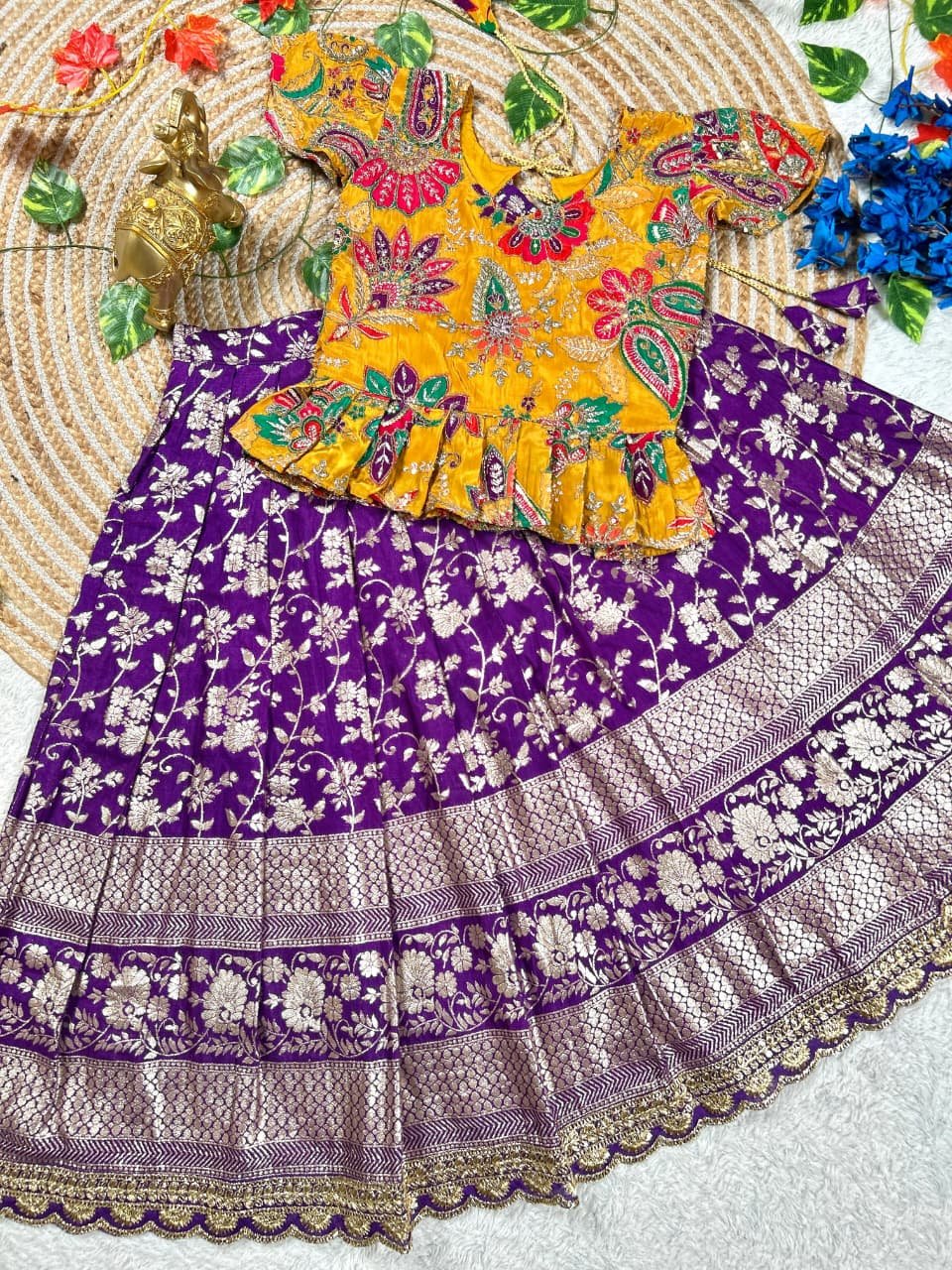 Adorable kids' collection featuring a position print blouse paired with a golden jari work skirt. The outfit combines playful prints with luxurious golden Weaving, perfect for little ones to shine on special occasions. - Image 5
