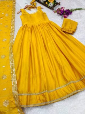 Alternative view of ~ Illuminating festive elegance! ✨ Unveiling our stunning yellow floor-length maxi in Chinnon Fabric, paired with an intricately embroidered dupatta. Perfect for festive celebrations or pre-wedding events like Haldi, this outfit radiates timeless elegance!