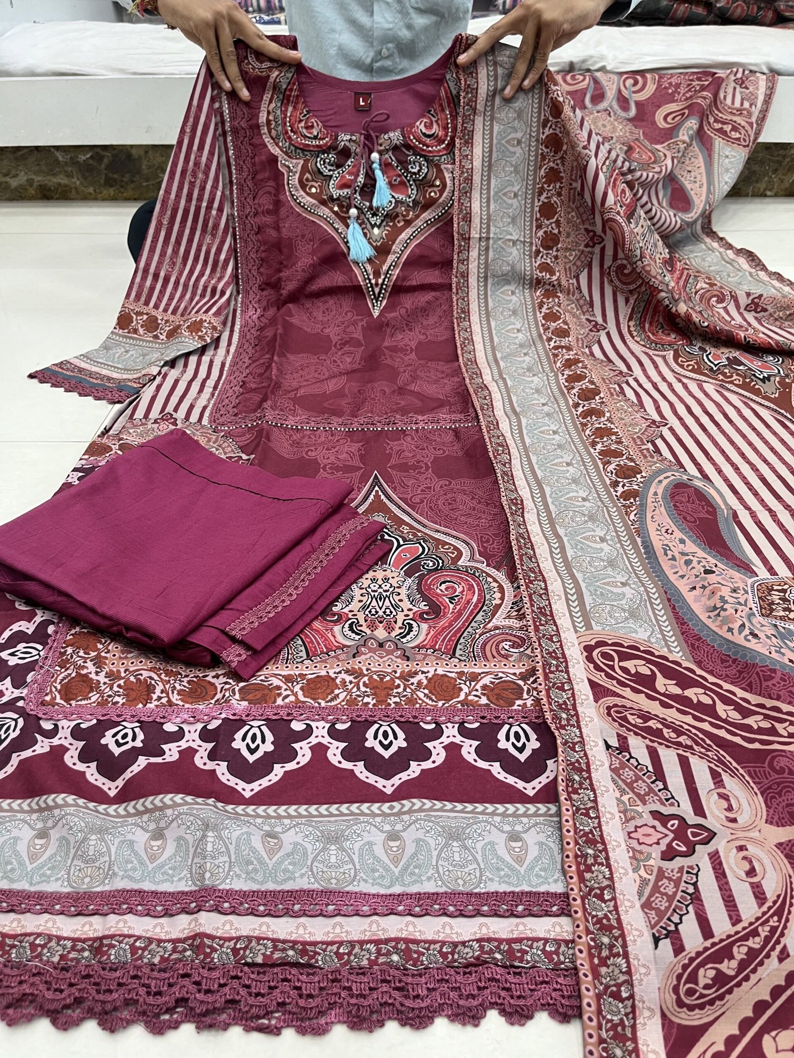Featuring Rajhans Muslin Pakistani Suit which is beautifully decorated with digital prints and hand embroidery. It is absolutely perfect for your upcoming occasions, it is very easy breezy and comfortable. - Image 3