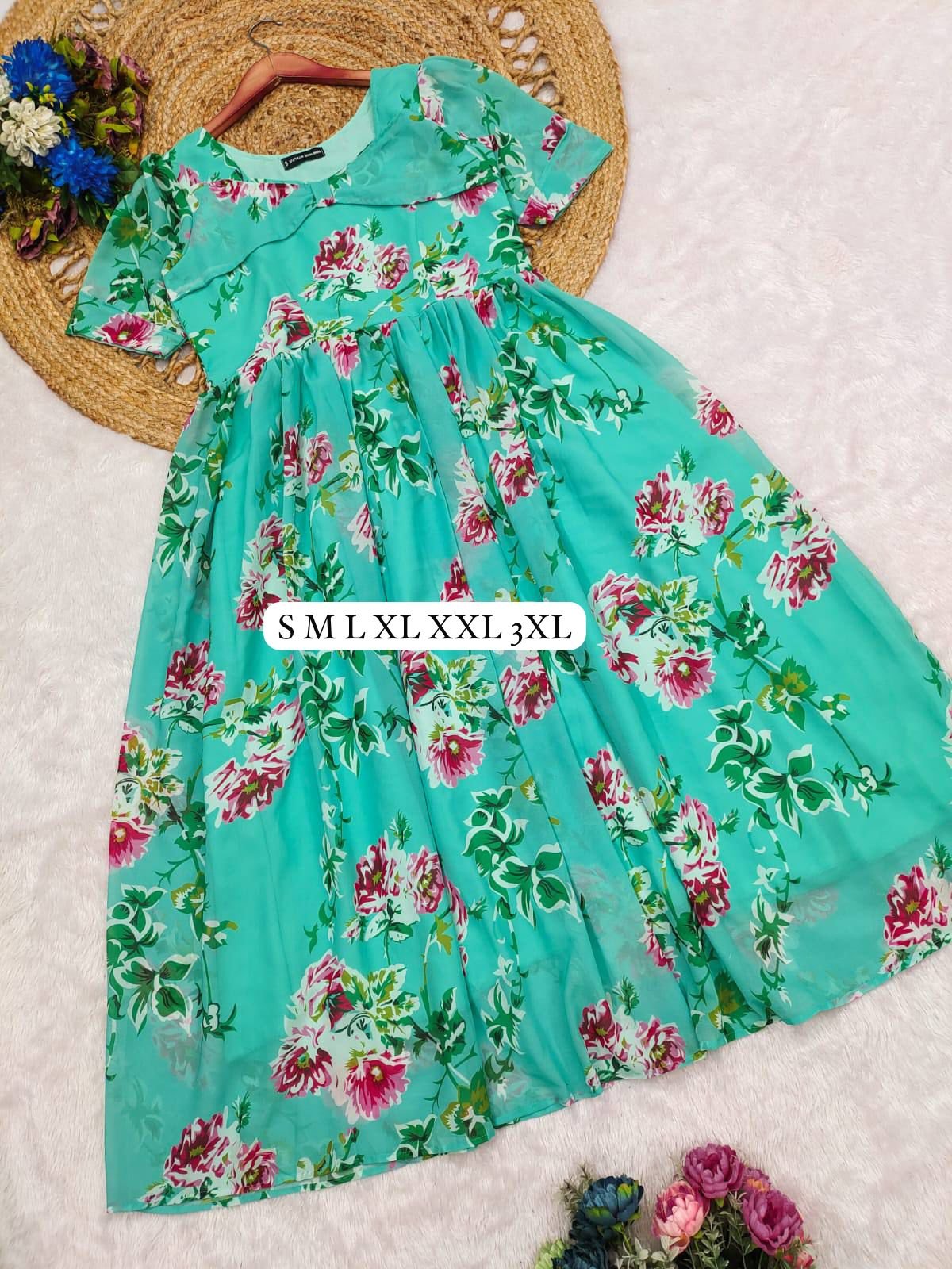 stitched BEAUTIFUL VACATION SPECIAL COLLECTION Plan your holidays in style Elevate your style with the beautiful Georgette Maxi Dress, a chic and contemporary piece crafted from luxurious georgette fabric. Its flattering silhouette and subtle flare accentuate your curves while adding a touch of sophistication to any occasion. - Image 4