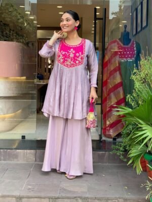 stitched Featuring beautiful Heavy Suit Set which is beautifully decorated Handwork on yoke. It is paired with matching plazzo Pair.