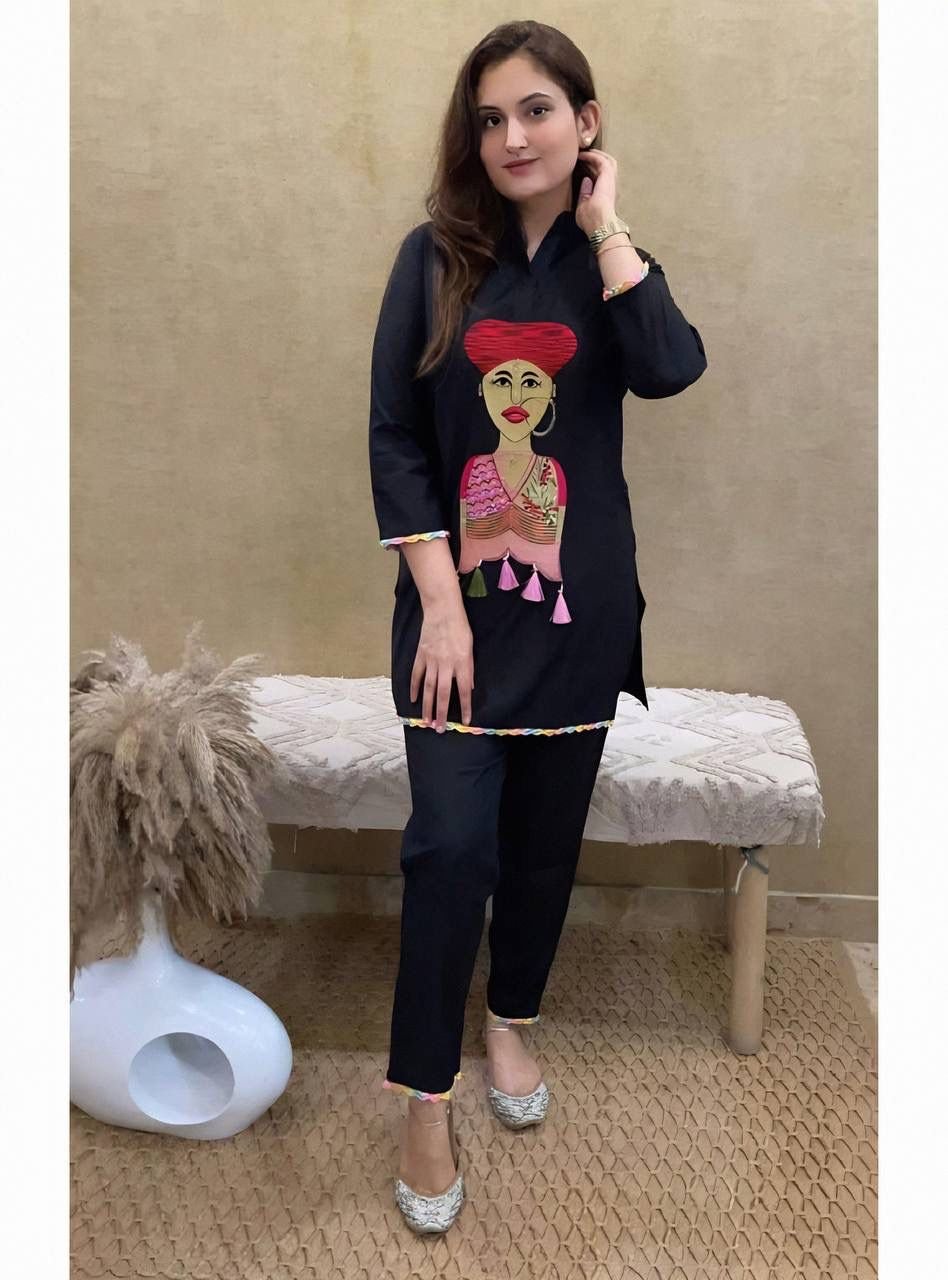 stitched AK-G29 Black & White Color Anarkali Suit Set seems to be a party wear outfit made from Maslin fabric with Fancy multicolor Lace Border with Embroidery Chain Works(2-Pair)