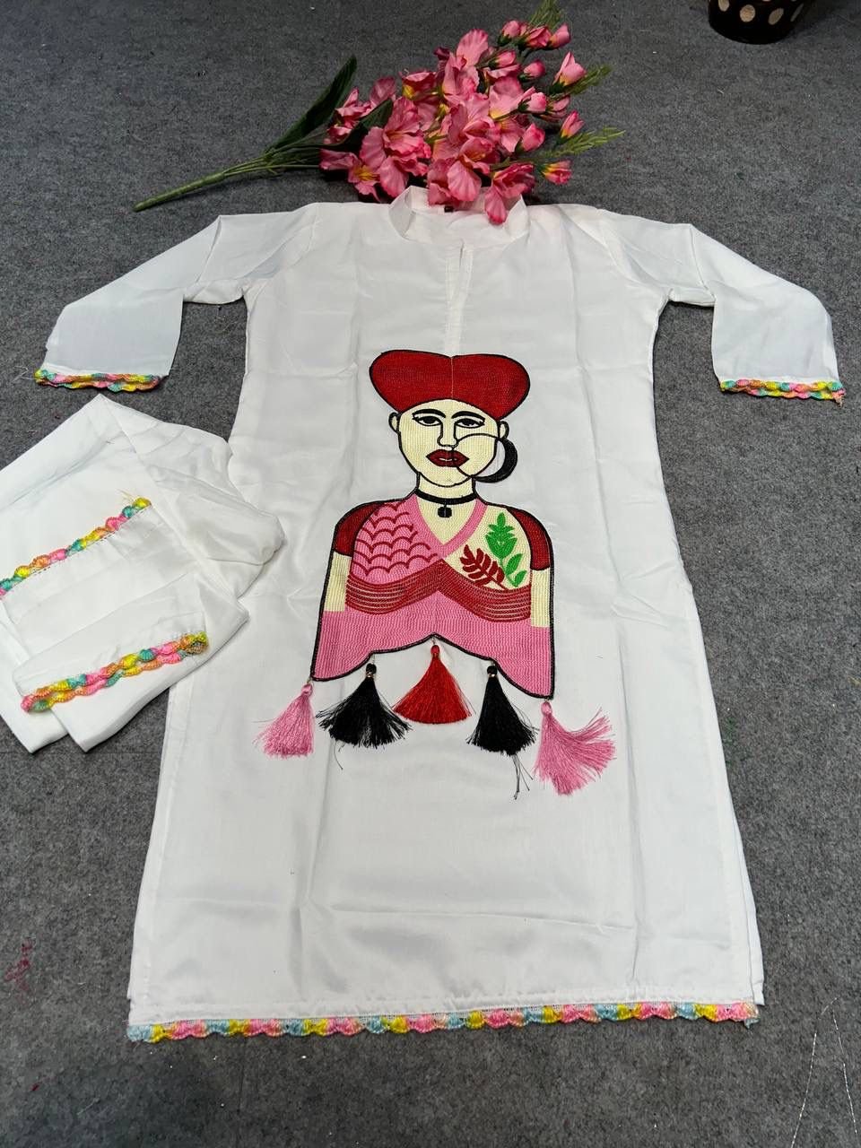 stitched AK-G29 Black & White Color Anarkali Suit Set seems to be a party wear outfit made from Maslin fabric with Fancy multicolor Lace Border with Embroidery Chain Works(2-Pair) - Image 4