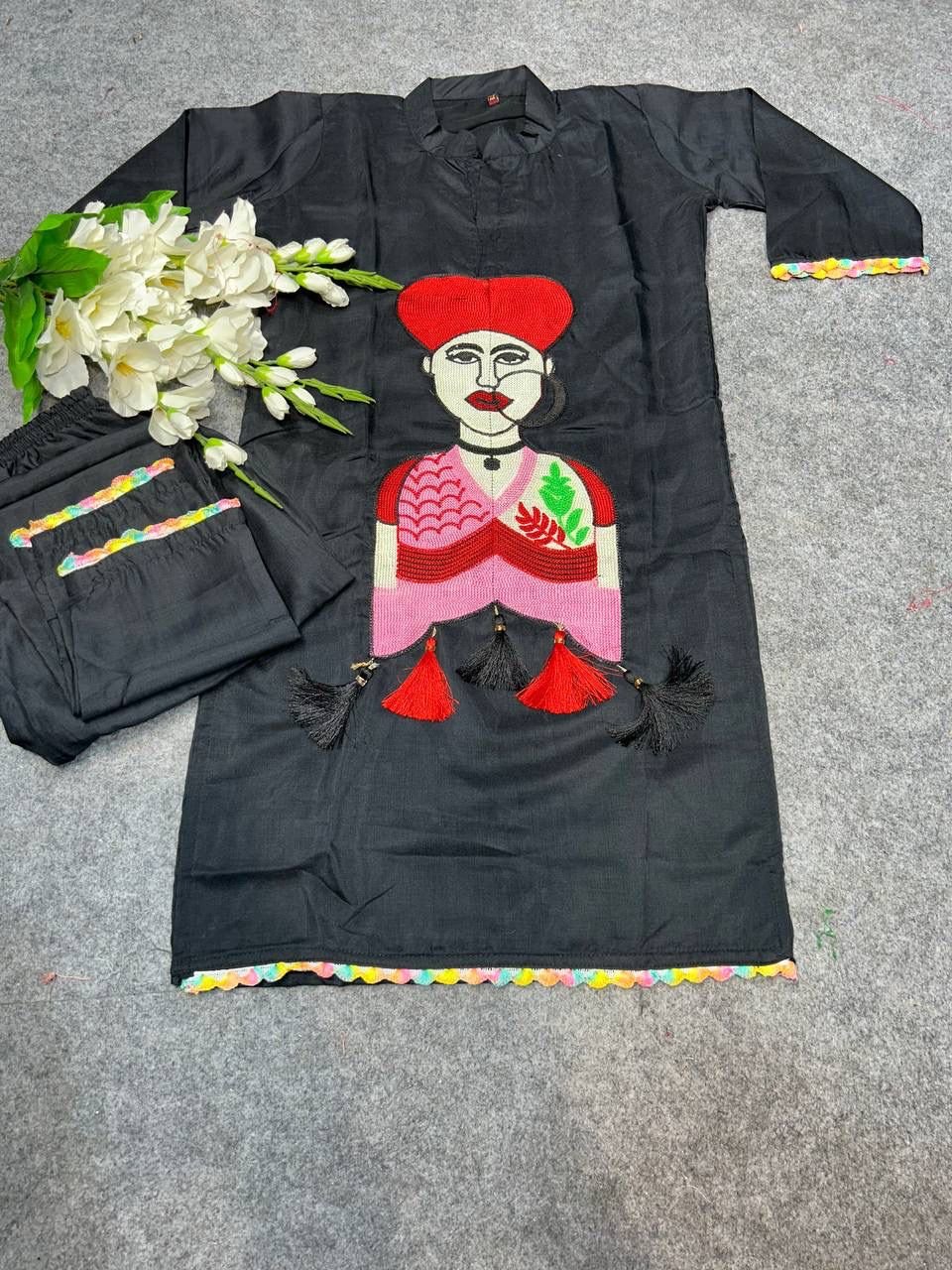 stitched AK-G29 Black & White Color Anarkali Suit Set seems to be a party wear outfit made from Maslin fabric with Fancy multicolor Lace Border with Embroidery Chain Works(2-Pair) - Image 2