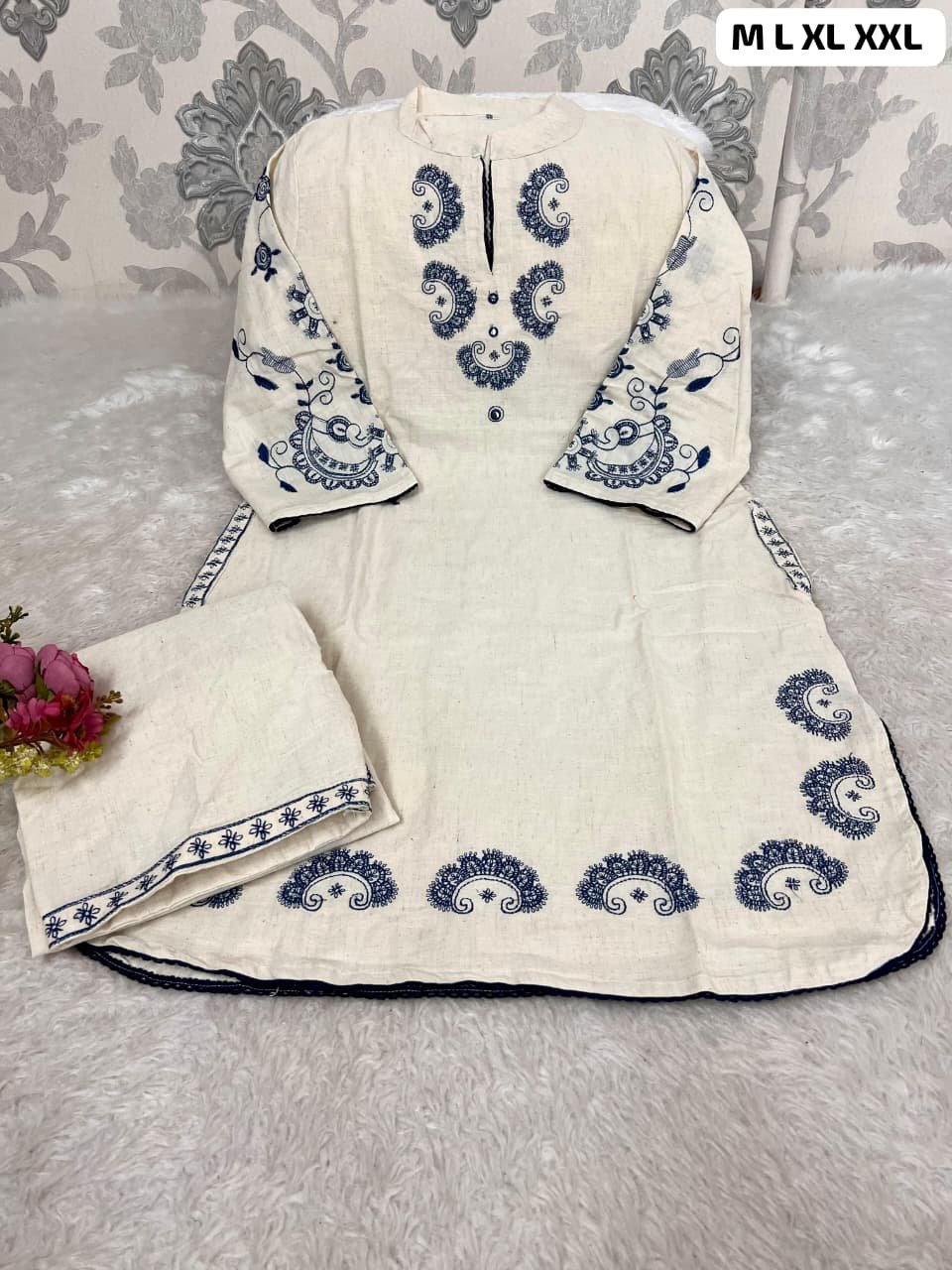 stitched Detailed embroidery adds a touch of sophistication, while side pockets make it super practical - Image 2