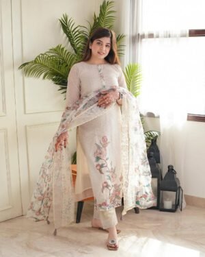 stitched Lilan Full Workd Set   Festival Collection   Elevate your casual and festive wardrobe with this elegant off-white printed Lilan suit set. Crafted for both comfort and style, this outfit offers a sophisticated yet effortless look.