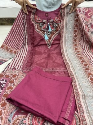 Alternative view of Featuring Rajhans Muslin Pakistani Suit which is beautifully decorated with digital prints and hand embroidery. It is absolutely perfect for your upcoming occasions, it is very easy breezy and comfortable.