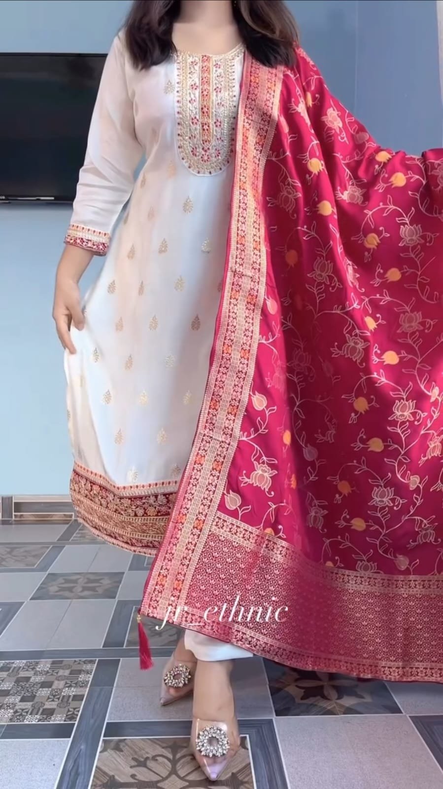 The pure Kanjivaram Silks 🪷 kurta is adorned with intricate machine embroidery coding across the sleeves and neckline, lending a touch of regal finesse. It is paired with very comfortable pants for effortless wear and a flowing silhouette. Completing the ensemble is a statement pure zari stripe Kanjivaram Silk dupatta, beautifully dyed to perfection, adding grandeur and festive charm.