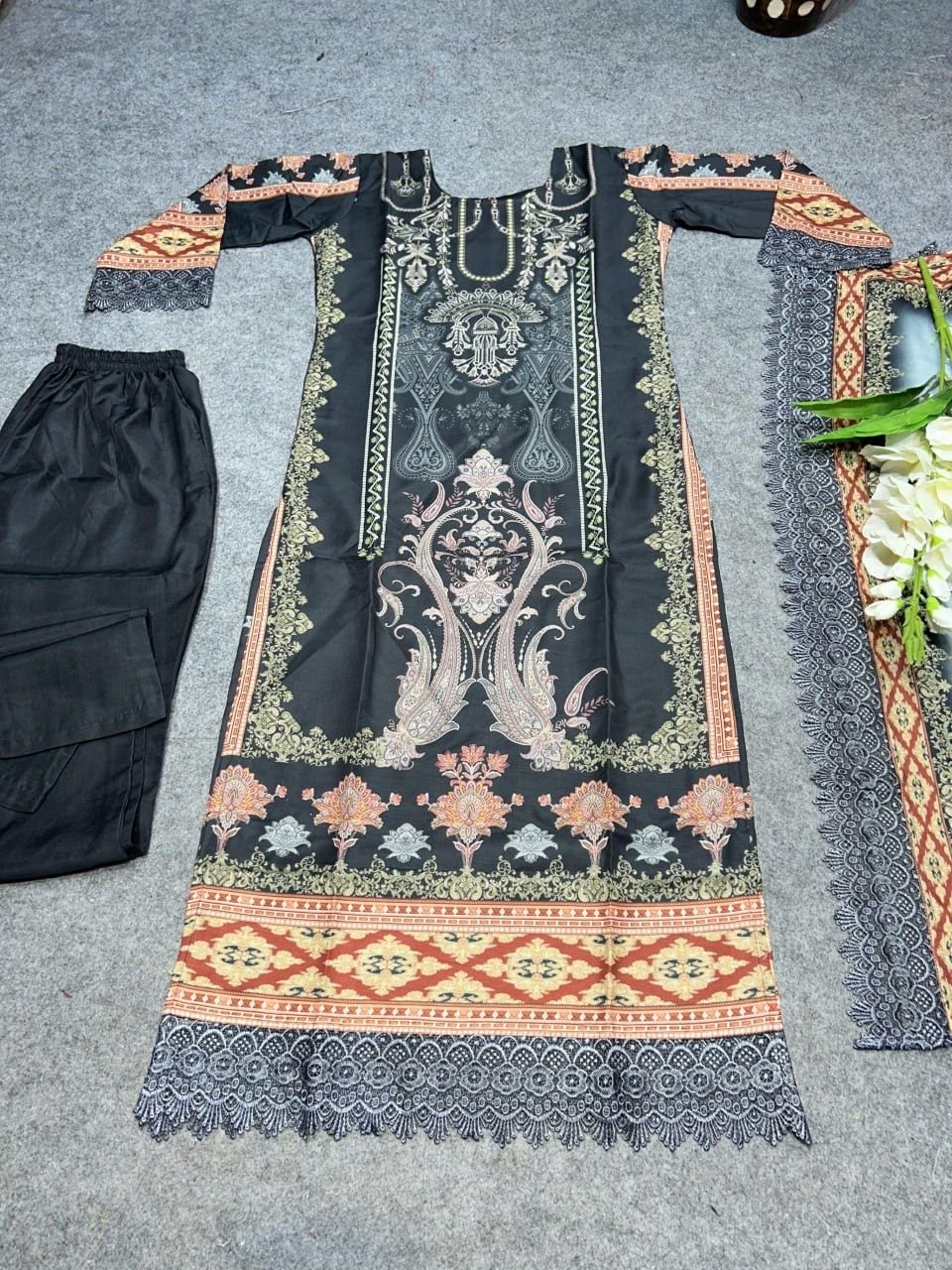 Black Anarkali Suit Set you've described seems to be a party wear outfit made from Maslin fabric with digital prints Muslin Duptta Fancy Lace Border .(3-Pair) - Image 2