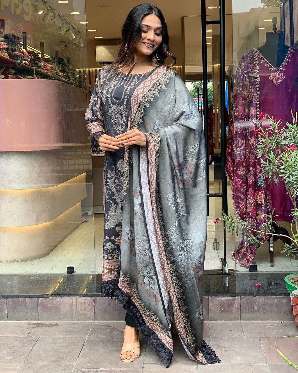 Black Anarkali Suit Set you've described seems to be a party wear outfit made from Maslin fabric with digital prints Muslin Duptta Fancy Lace Border .(3-Pair)