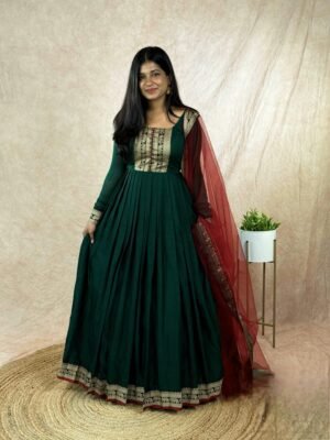 This gown made from  vichitra silk fabric with Jacquard weaving zari border And Soft Net Duppatta with lace border