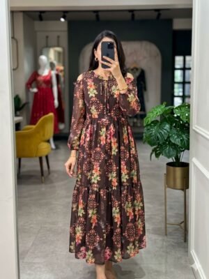 Alternative view of Introducing our latest  essential: the Floral Dresses. Crafted for comfort, this easy-breezy dress features a delightful  floral print. With a charming  neck detail and playful frill at the bottom, it’s perfect for sunny days.