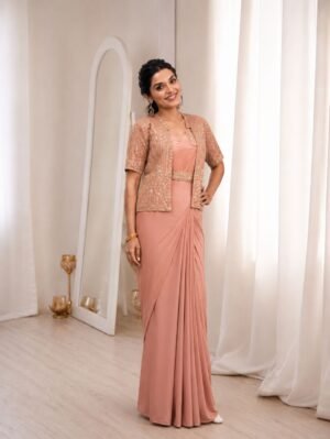 Experience effortless luxury with this premium ready-to-wear saree. Expertly tailored with precise pleats and a refined finish, it delivers a sophisticated look without compromising comfort.
