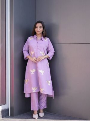 Step into timeless elegance with this beautifully crafted 2 piece suit set featuring a roman Silk Kurti, matching Palazzo,