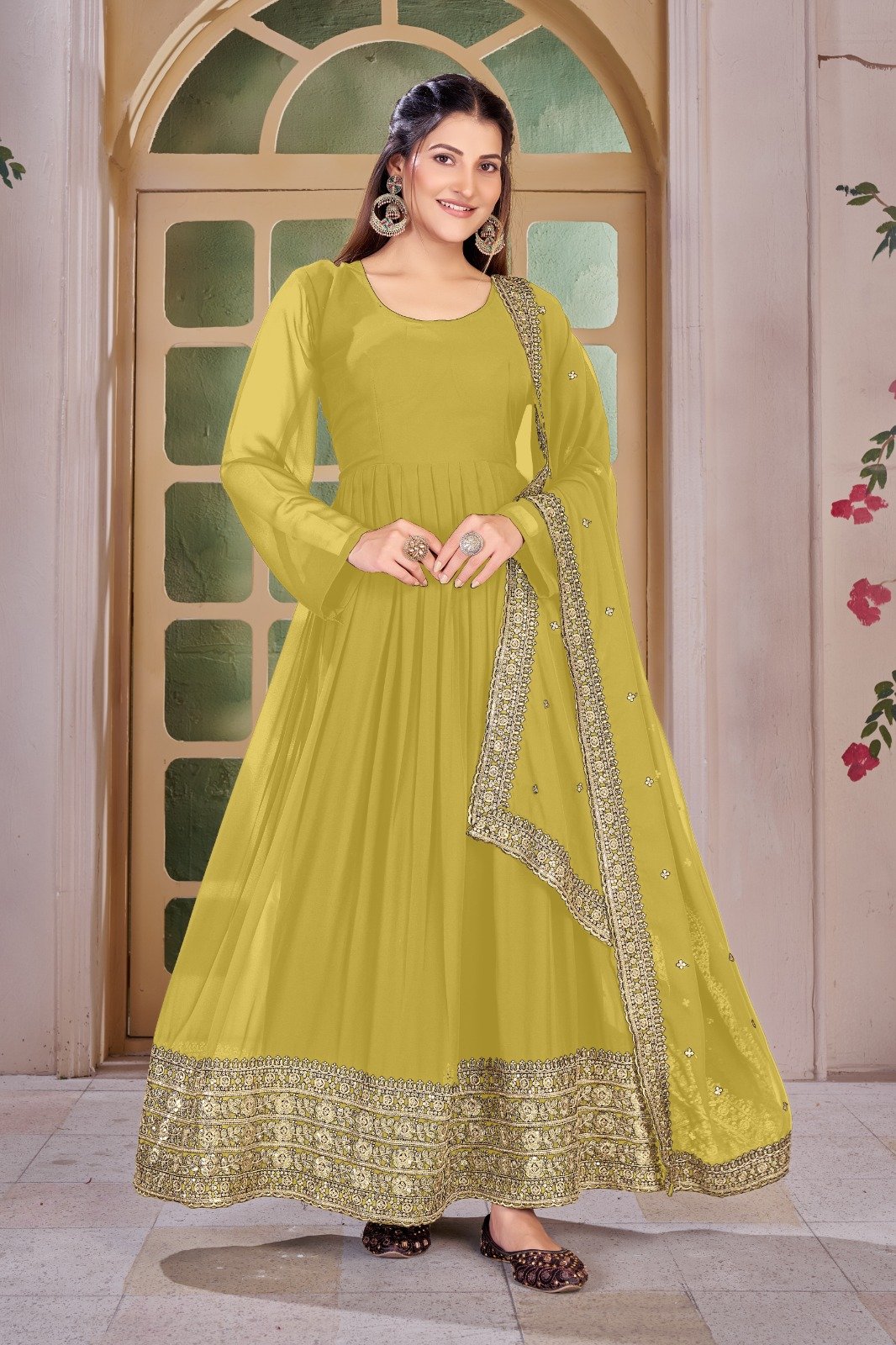 Real Modeling Short Georgette Anarkali Gown Which Is Beautiful Round Nack With decorated With Embroidery is absolutely perfect for your upcoming occasions, it is very easy breezy and comfortable.