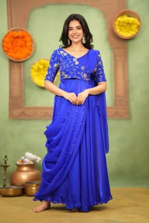 This Dress is a contemporary Indo-western draped gown, often referred to as a Saree-style gown or a Pre-draped Anarkali.