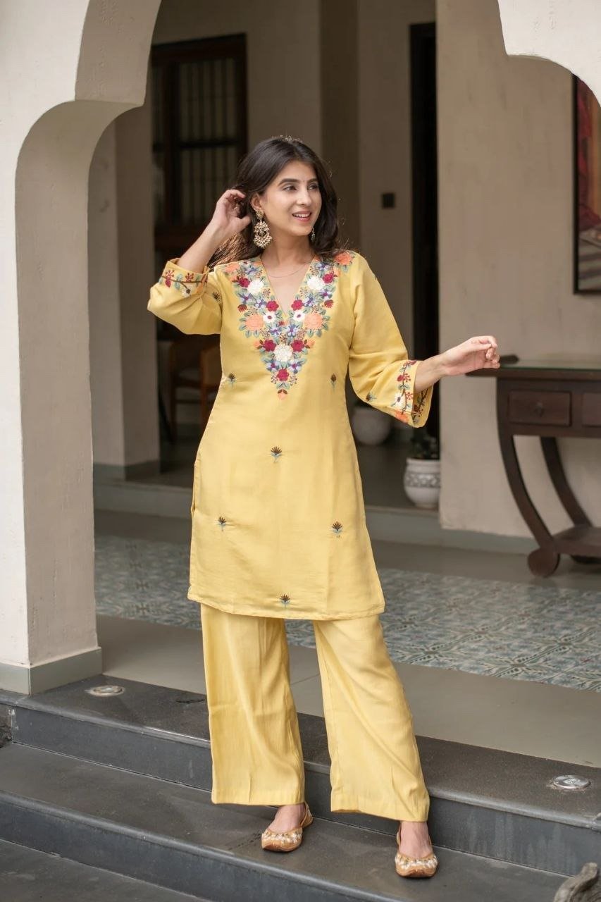 Featuring Lilac New Party wear Kurati With Top With Palazzo Set which is beautifully nack with decorated with and heavy Embroidery Sequence Work.