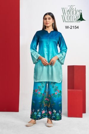 This satin teal kurta paired with statement floral bottoms is all about grace with a touch of bold. Perfect blend of comfort and style