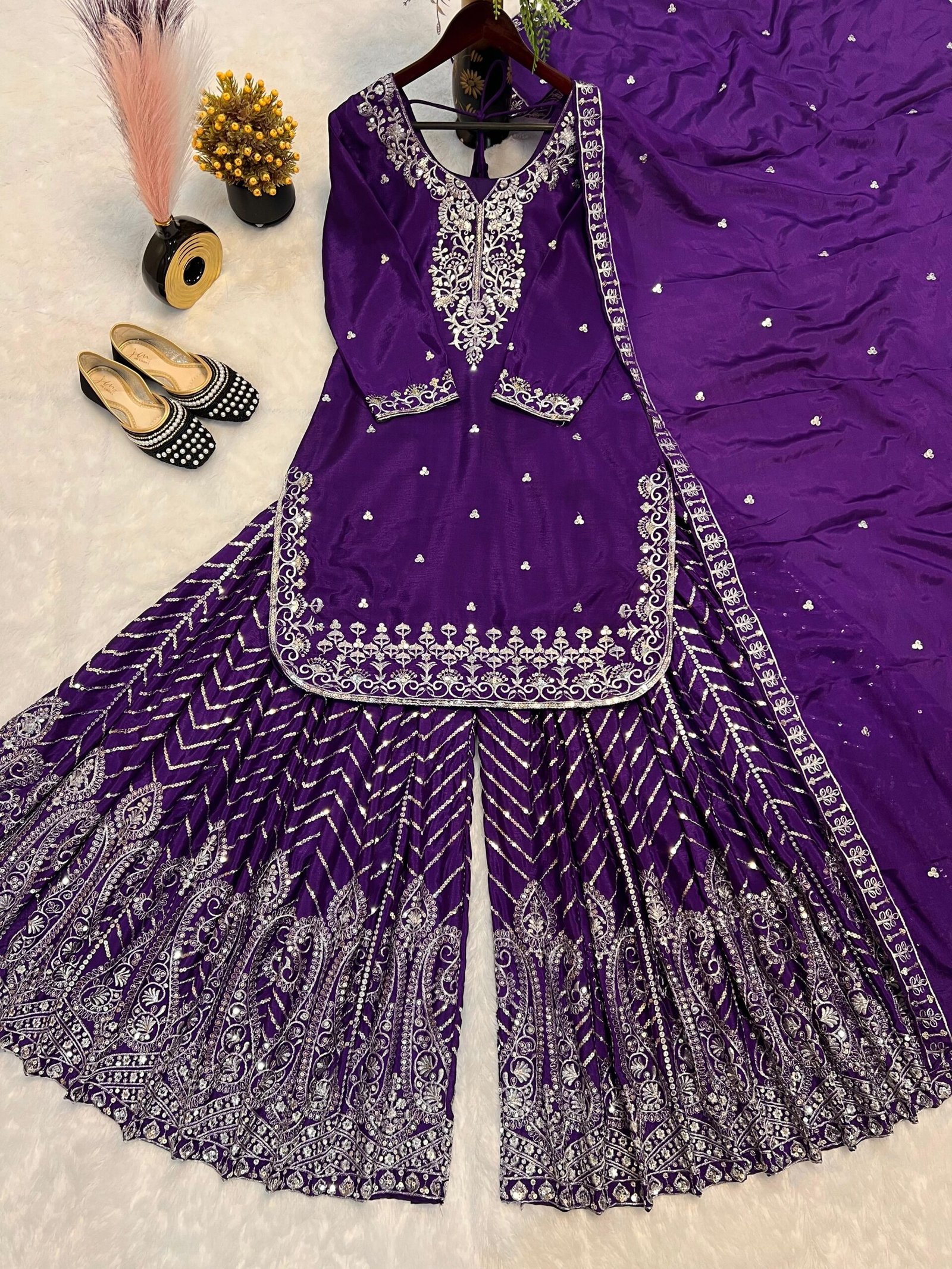 Pure Heavy Chinnon Silk With Heavy Embroidery Work With Fancy Borders Less Work Sleeve With Fancy Latkan Dori. - Image 4