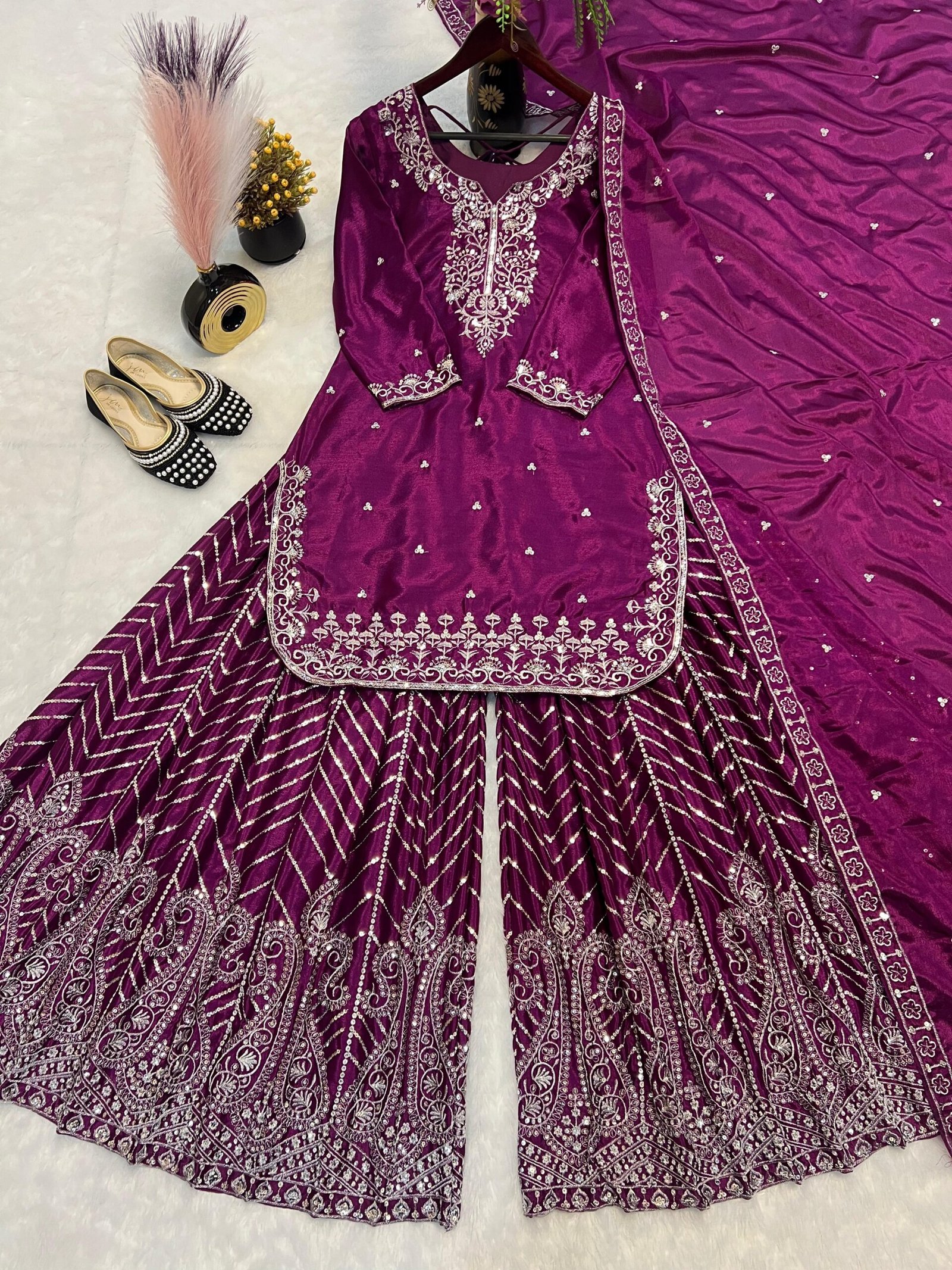 Pure Heavy Chinnon Silk With Heavy Embroidery Work With Fancy Borders Less Work Sleeve With Fancy Latkan Dori. - Image 2
