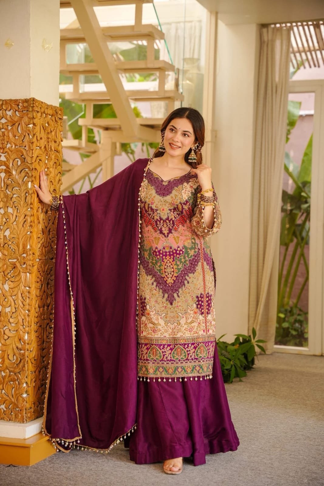Elevate your festive wardrobe with this breathtaking 3-piece ethnic ensemble, crafted from premium, lightweight Chinon fabric.