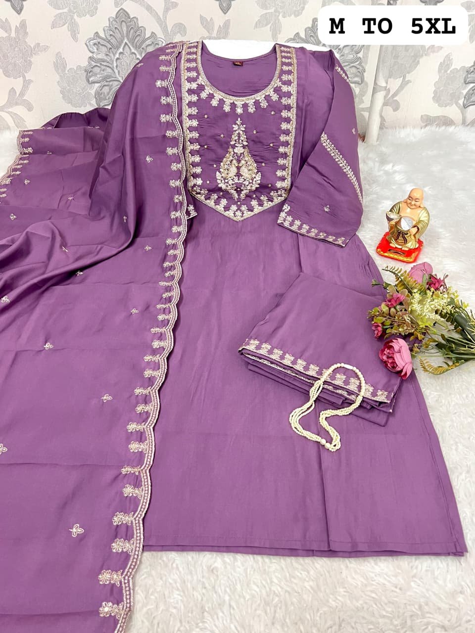 Upgrade your ethnic wardrobe with this beautiful Muslin fabric suit set in a classy Colorfull shade - Image 3