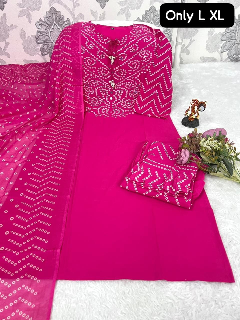 Looking to update your ethnic wardrobe? Check out this stunning Bandhani Suit Set