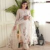Elevate your casual and festive wardrobe with this elegant off-white printed Lilan suit set. Crafted for both comfort and style, this outfit offers a sophisticated yet effortless look