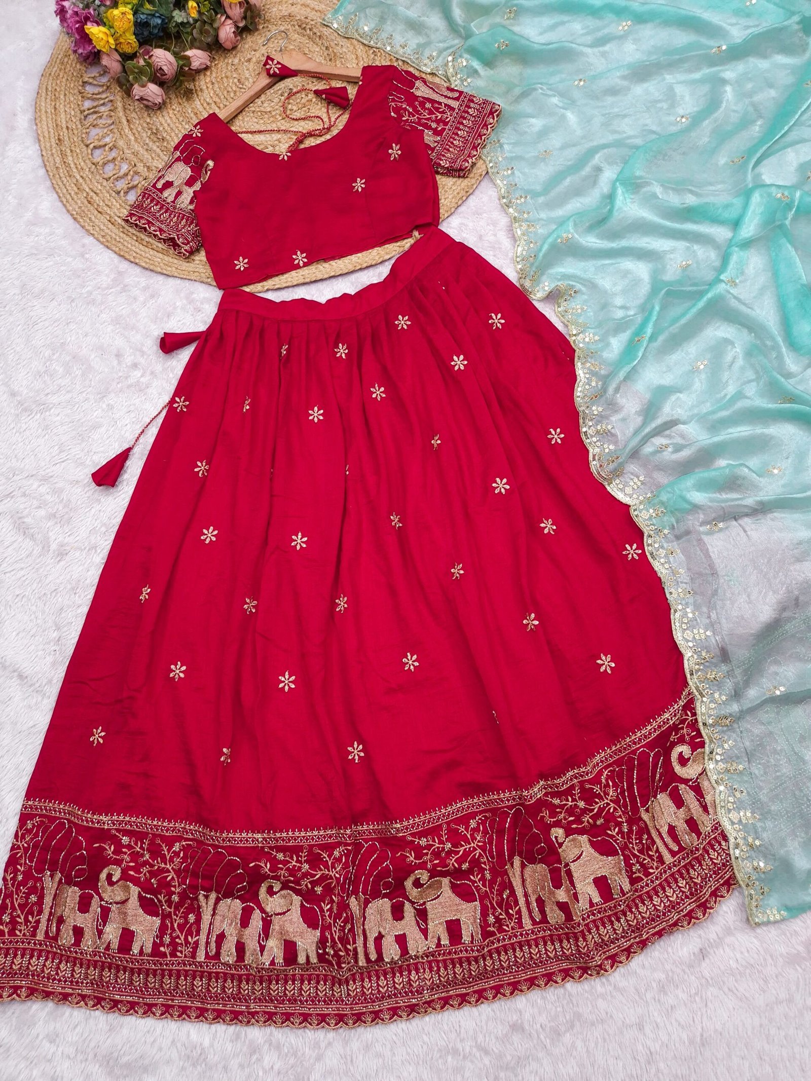 Radiate timeless elegance in this stunning lehenga choli, featuring a striking contrast between a rich, deep pink base and a soothing pastel green dupatta - Image 2