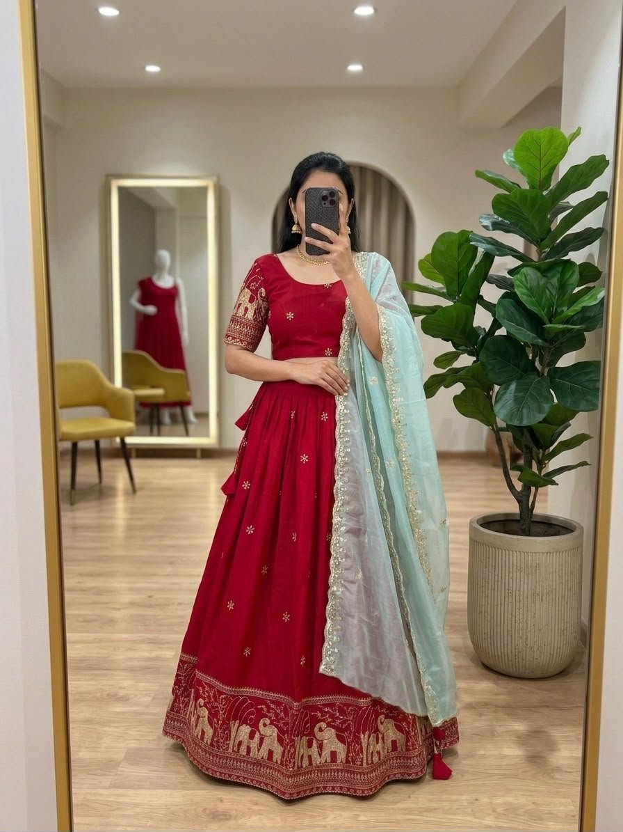 Radiate timeless elegance in this stunning lehenga choli, featuring a striking contrast between a rich, deep pink base and a soothing pastel green dupatta