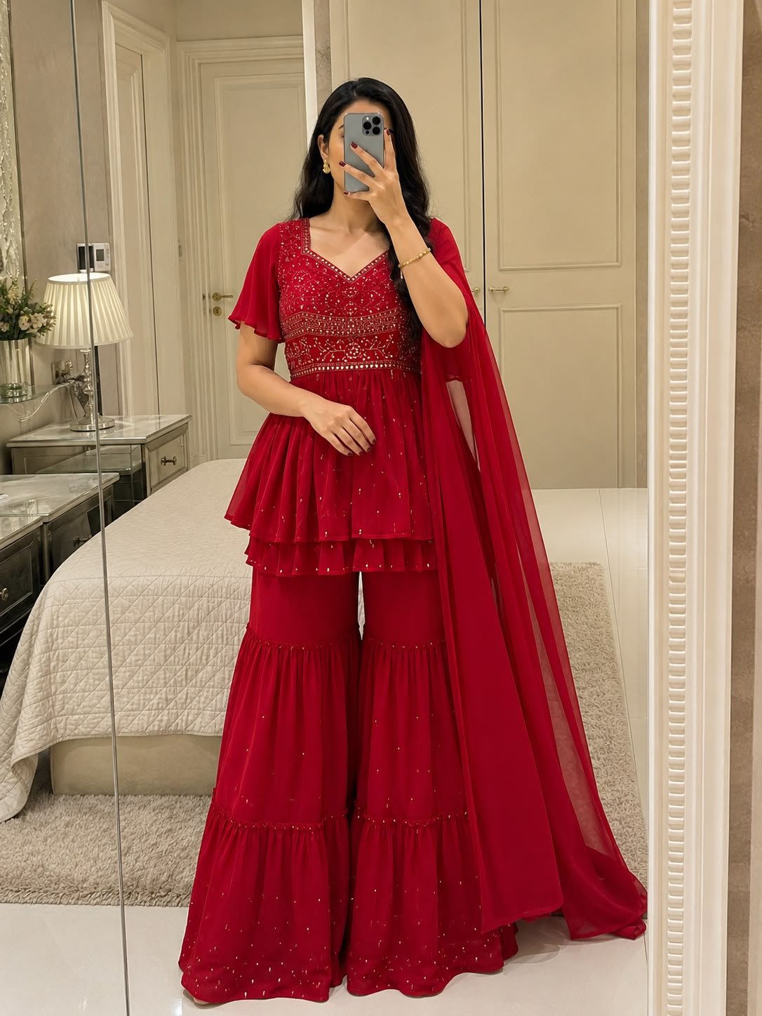 Drape yourself in elegance with this Sharara style Georgette Sharara set paired with a beautiful dupatta.