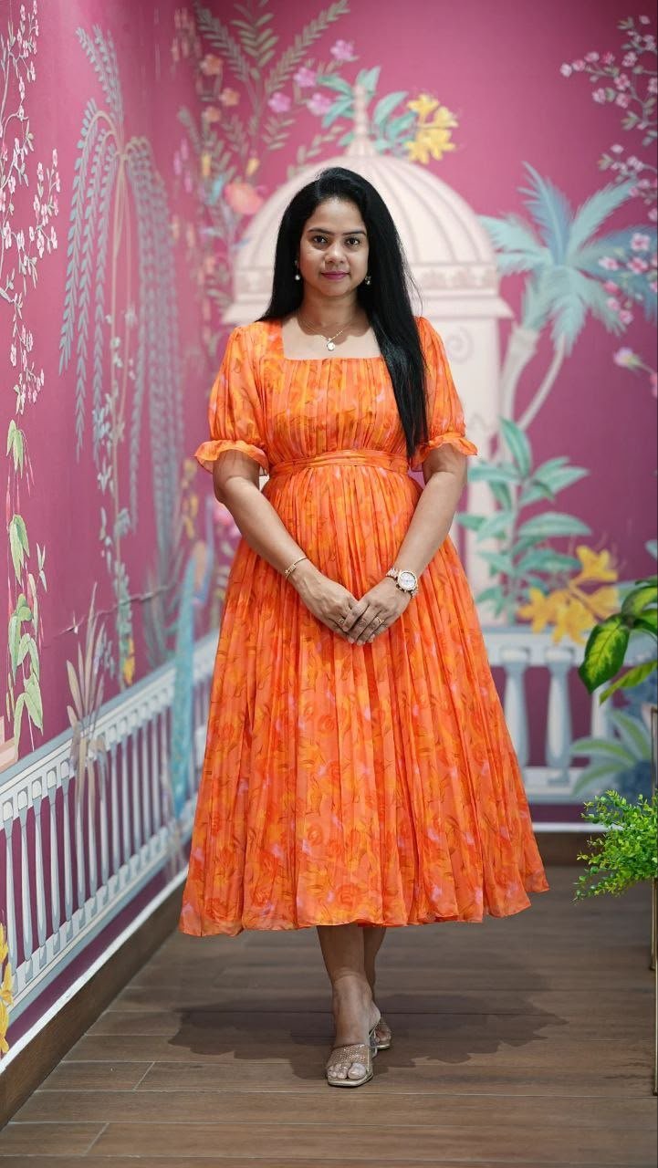 Introducing our latest essential: the Floral Dresses. Crafted for comfort, this easy-breezy dress features a delightful floral print. With a charming neck detail and playful frill at the bottom, it’s perfect for sunny days. - Image 7