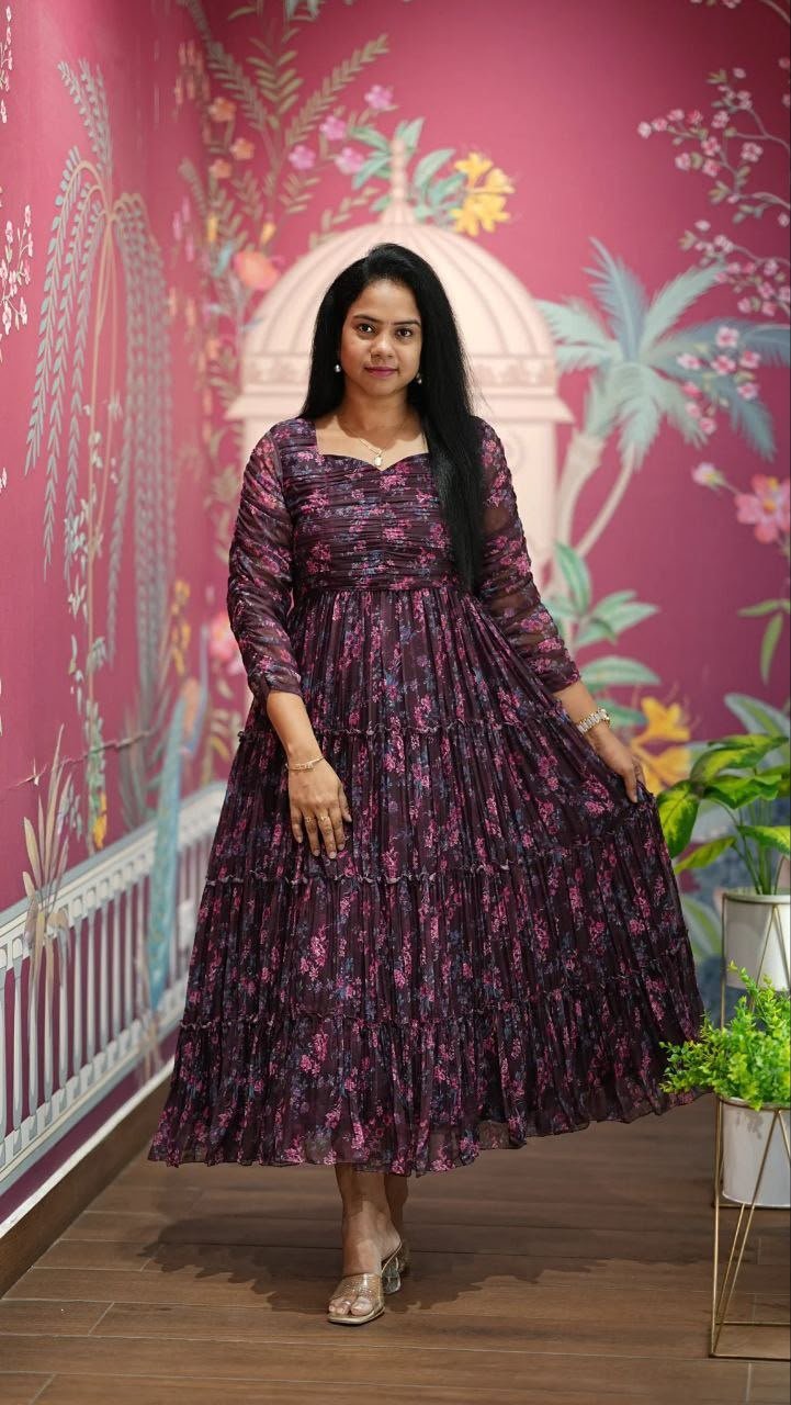 Introducing our latest essential: the Floral Dresses. Crafted for comfort, this easy-breezy dress features a delightful floral print. With a charming neck detail and playful frill at the bottom, it’s perfect for sunny days. - Image 5