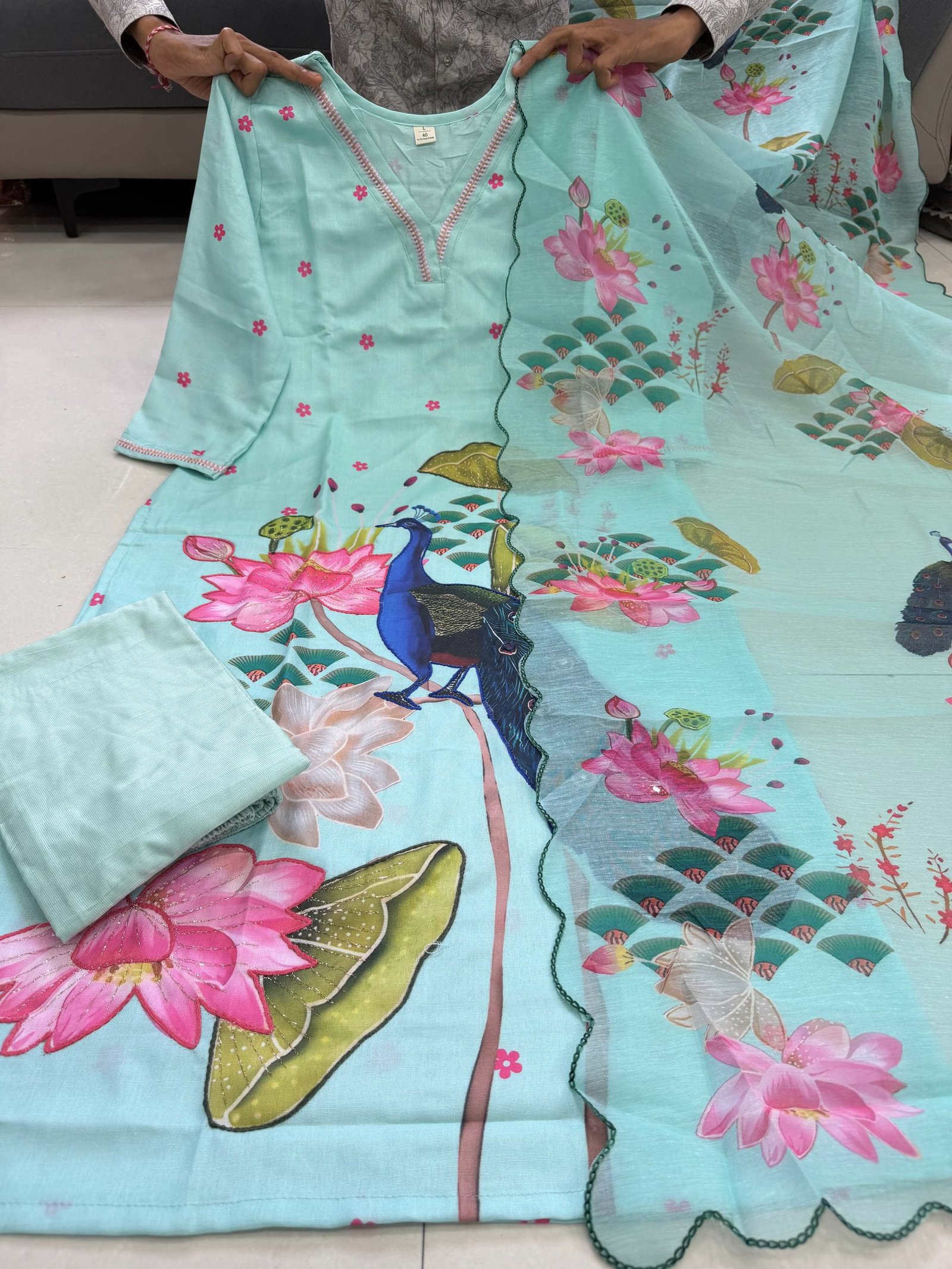 Inspired by the beauty of nature, this premium 3-piece suit features exquisite peacock artwork, delicate hand Katha detailing, and a beautifully embroidered dupatta. Crafted to make every occasion feel special. - Image 2