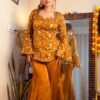Radiate effortless elegance in this stunning golden-mustard peplum set. It is a perfect blend of modern charm and timeless grace.