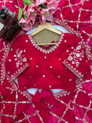 Alternative view of Fall in love with this stunning saree in an eye-catching shade, crafted with finesse and rich detailing. A perfect blend of grace and glam!