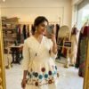 THE TOP HAVING BEAUTIFUL NECK PATTERN WID DORI FOR SIZE ADUATMENT