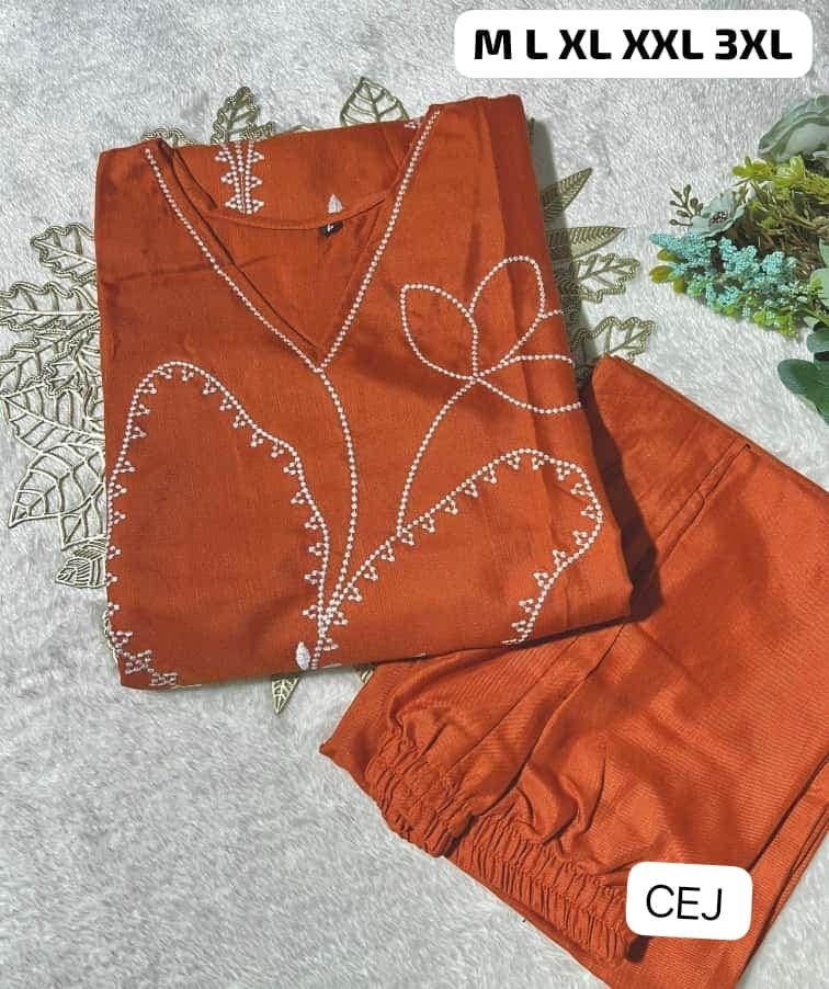 Featuring Beautiful Suit Sets in Soft Tesla Slub Top With Pant, it is beautifully decorated with Thread work desgins - Image 4