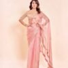 Fall in love with this stunning saree in an eye-catching shade, crafted with finesse and rich detailing. A perfect blend of grace and glam!