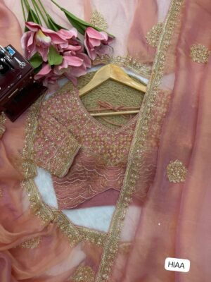 Alternative view of Fall in love with this stunning saree in an eye-catching shade, crafted with finesse and rich detailing. A perfect blend of grace and glam!