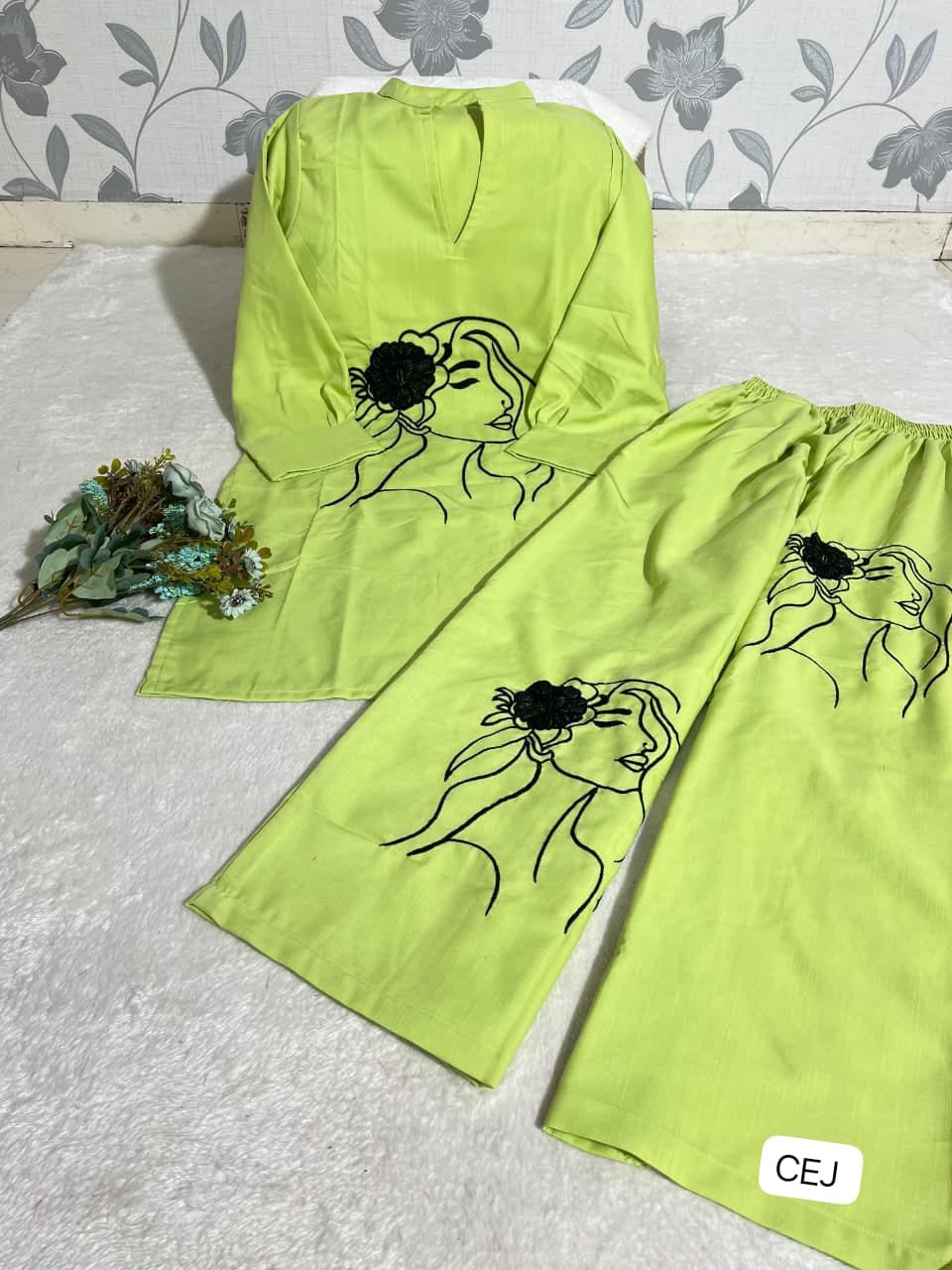 Featuring Beautiful Cord-Set in Soft Tesla Slub Top With Plazzo. it is beautifully decorated with thread work desgins