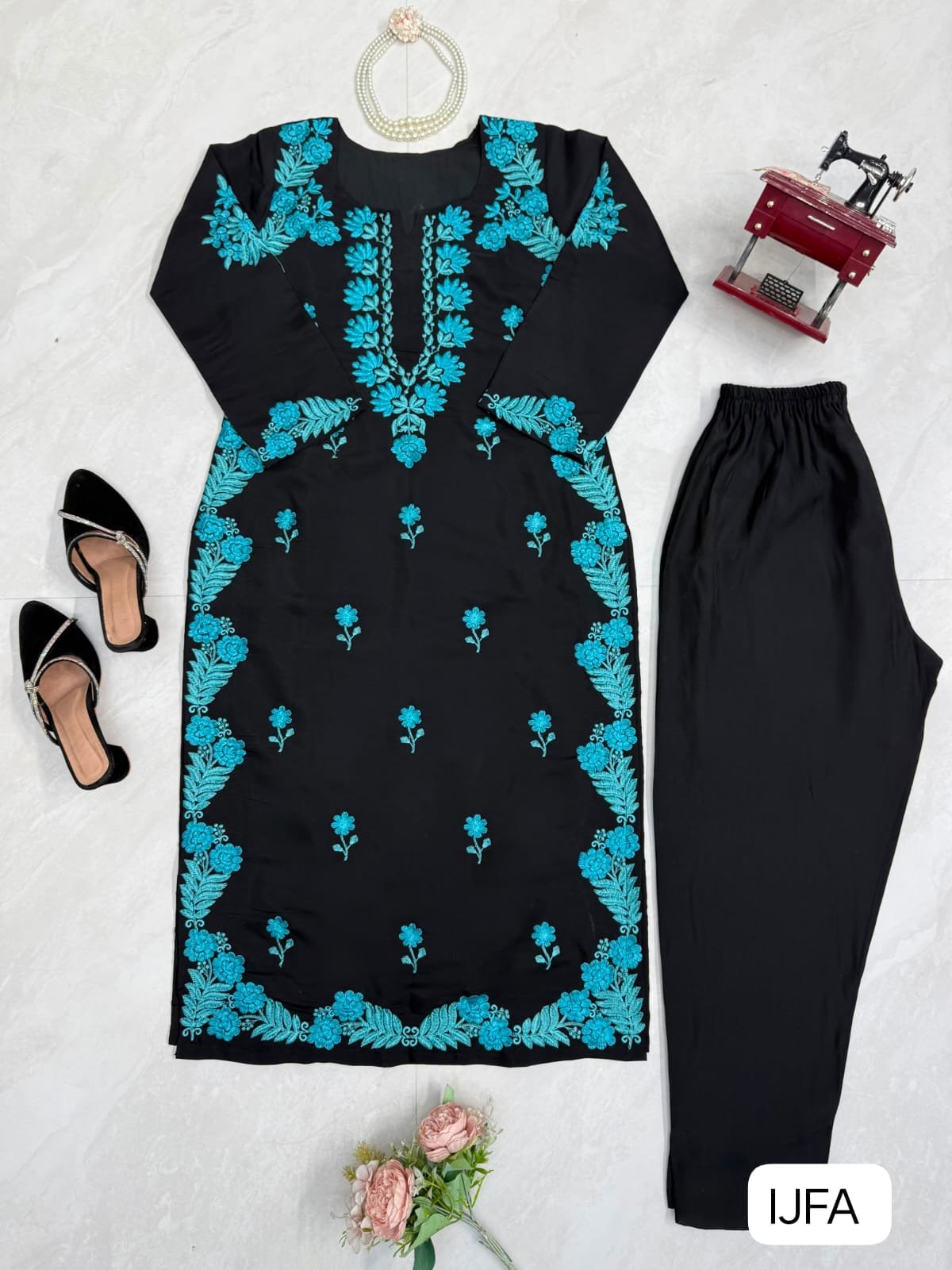 tep into effortless charm with our exclusive 2-piece set β crafted for comfort, stitched with grace. - Image 2