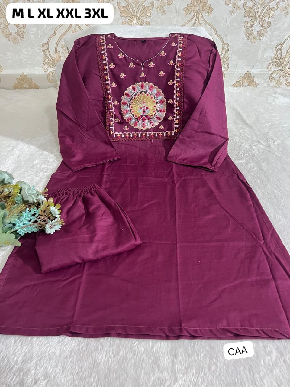 Featuring Beautiful Suit Sets in Soft Tesla Slub Top With Pant, it is beautifully decorated with Multi thread work & Original Mirror desgins