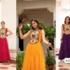 Celebrate Navratri in style with this vibrant Bandhani  gown, featuring a beautifully embroidered Gujarati-style yoke