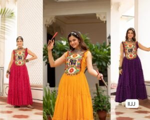 Celebrate Navratri in style with this vibrant Bandhani  gown, featuring a beautifully embroidered Gujarati-style yoke