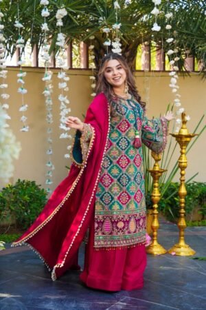 The outfit is completed with sharara and a matching heavy dupatta adorned with delicate pearl-bead trims.