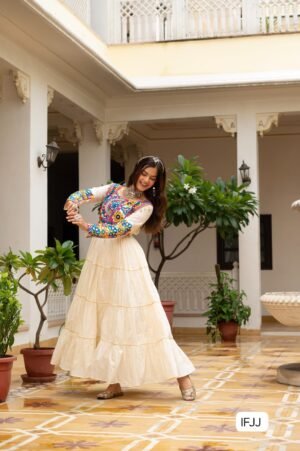 Celebrate the festive spirit in this beautifully fully flared Navratri gown, crafted from soft rayon or cotton fabric.